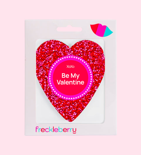 Premium Belgian chocolate (available in 3 variants - dark, milk or white) topped with vibrant red and pink sprinkles, wrapped in "Be My Valentine" design/label – a sweet gift for someone special.