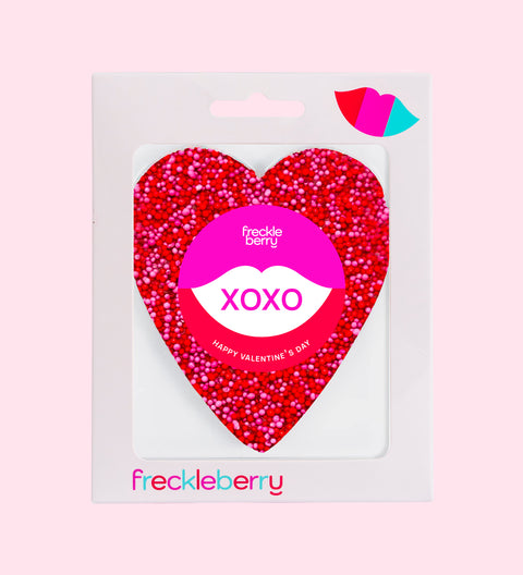 Premium Belgian chocolate (available in 3 variants - dark, milk or white) topped with vibrant red and pink sprinkles, wrapped in "XOXO" design/label – a sweet gift for someone special.