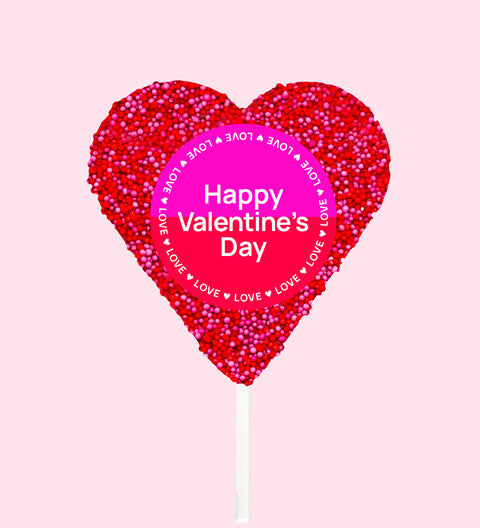 Creamy Belgian chocolate heart pop (available in 3 variants -dark, milk or white) covered in red and pink sprinkles with "Happy Valentine's Day" label/design, the perfect sweet gift to express your love.
