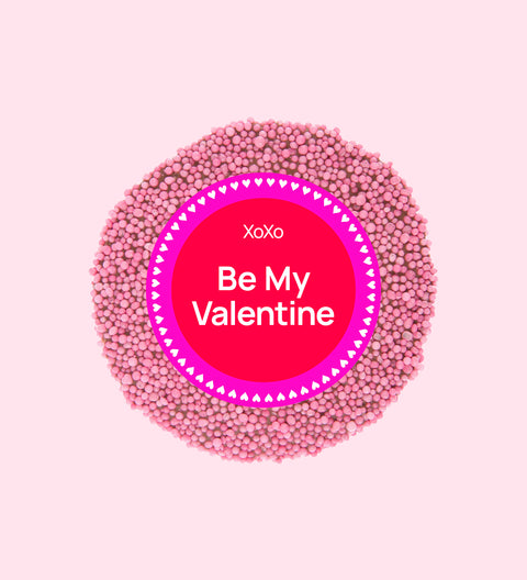 Premium Belgian chocolate topped with bright pink sprinkles, wrapped in a sweet Be My Valentine design – perfect for gifting.