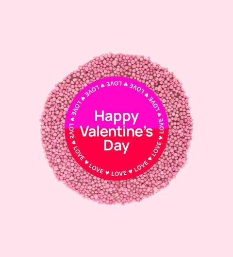 Premium Belgian chocolate topped with bright pink sprinkles, wrapped in a cheerful Happy Valentine’s Day design – perfect for gifting.
