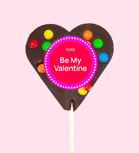 Creamy Belgian dark chocolate heart pop topped with colourful M&M®s with "Be My Valentine" label/design - a sweet way to share the love.