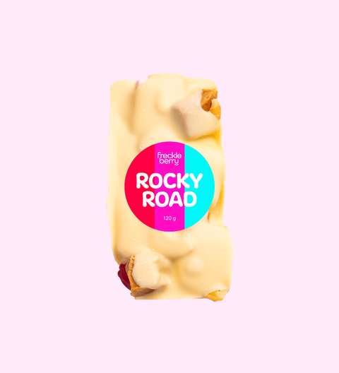 Rocky Road packed with marshmallows, nuts, and dried fruit, all coated in creamy premium Belgian white chocolate – a sweet and chewy delight.
