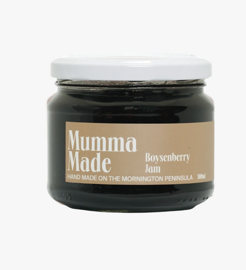 Jar of boysenberry jam with 'Mumma Made' label on a white background