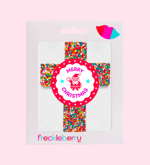 Santa sticker with merry Christmas on a chocolate cross 