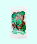 Mini half Belgian chocolate eggs with green sprinkles. Delicious 100% Belgian chocolate easter eggs.