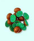 Mini half Belgian chocolate eggs with green sprinkles. Delicious 100% Belgian chocolate easter eggs