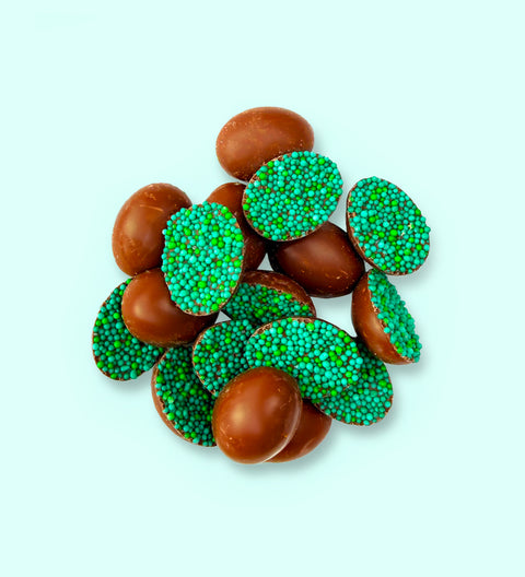 Mini half Belgian chocolate eggs with green sprinkles. Delicious 100% Belgian chocolate easter eggs