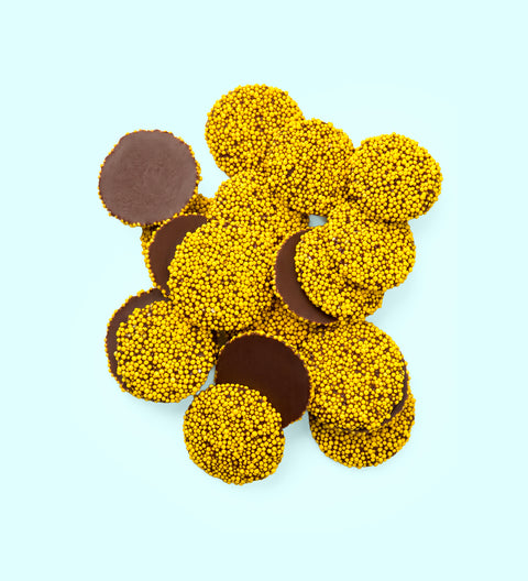 Packaged treats with a visible 'Proudly supporting RUOK?' logo on a light blue background