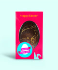 Close-up of yuzu and hazelnut flavour edition Easter egg with glossy chocolate finish